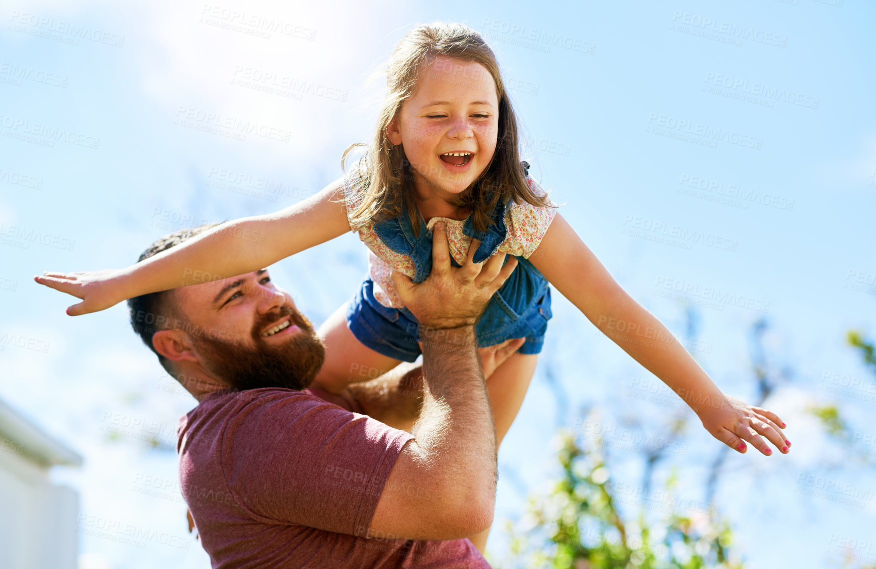 Buy stock photo Dad, girl and playing in backyard with flying, smile and fun on outdoor adventure with weekend games. Energy, father and child in garden together in playful support, trust or happiness with airplane