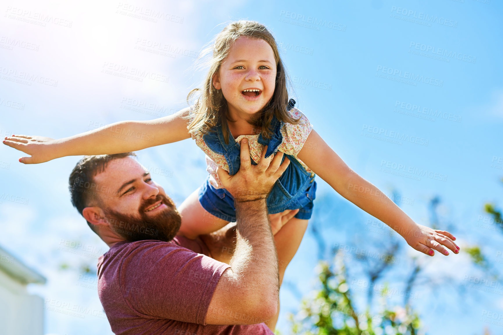 Buy stock photo Dad, kid and playing in backyard with flying, smile and fun on outdoor adventure with weekend games. Energy, father and girl in garden together in playful support, trust or happy growth with airplane