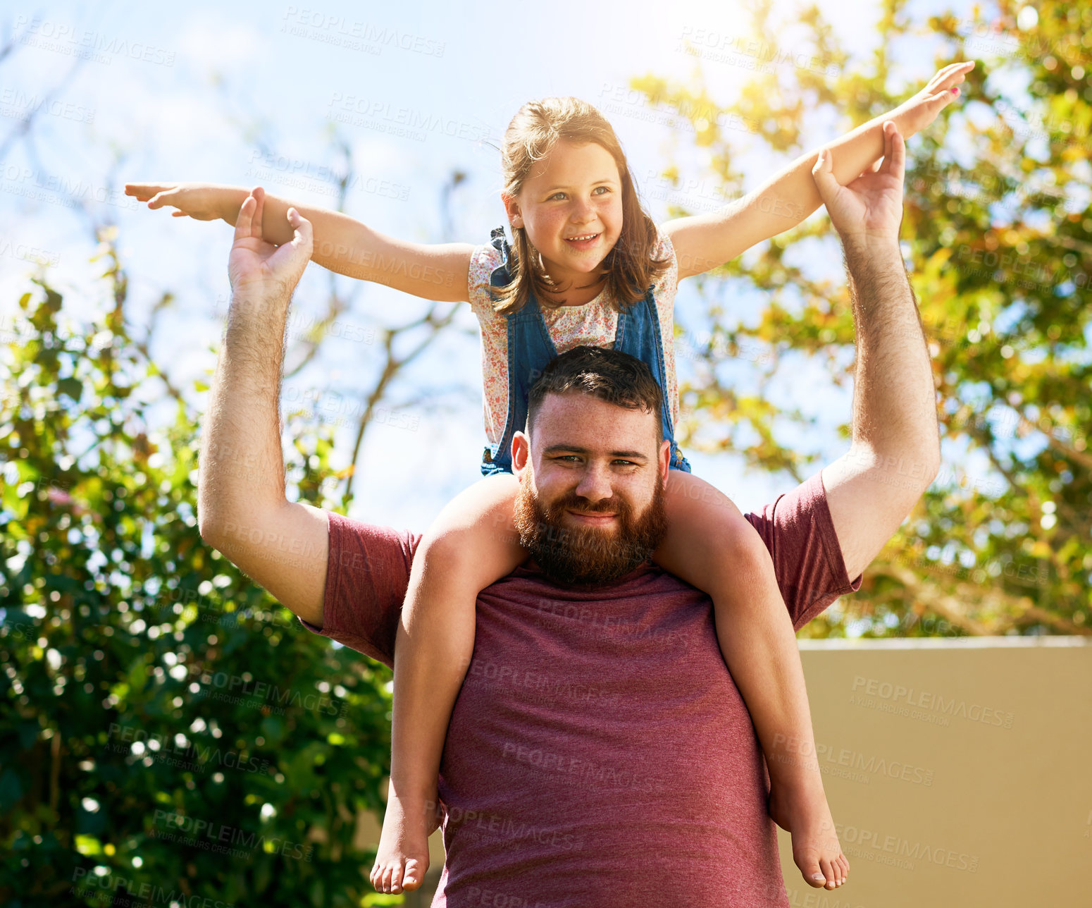 Buy stock photo Playing, dad and kid on shoulder in garden with bonding, smile and fun on outdoor adventure with weekend games. Energy, father and girl in backyard together in playful support, trust or happy love