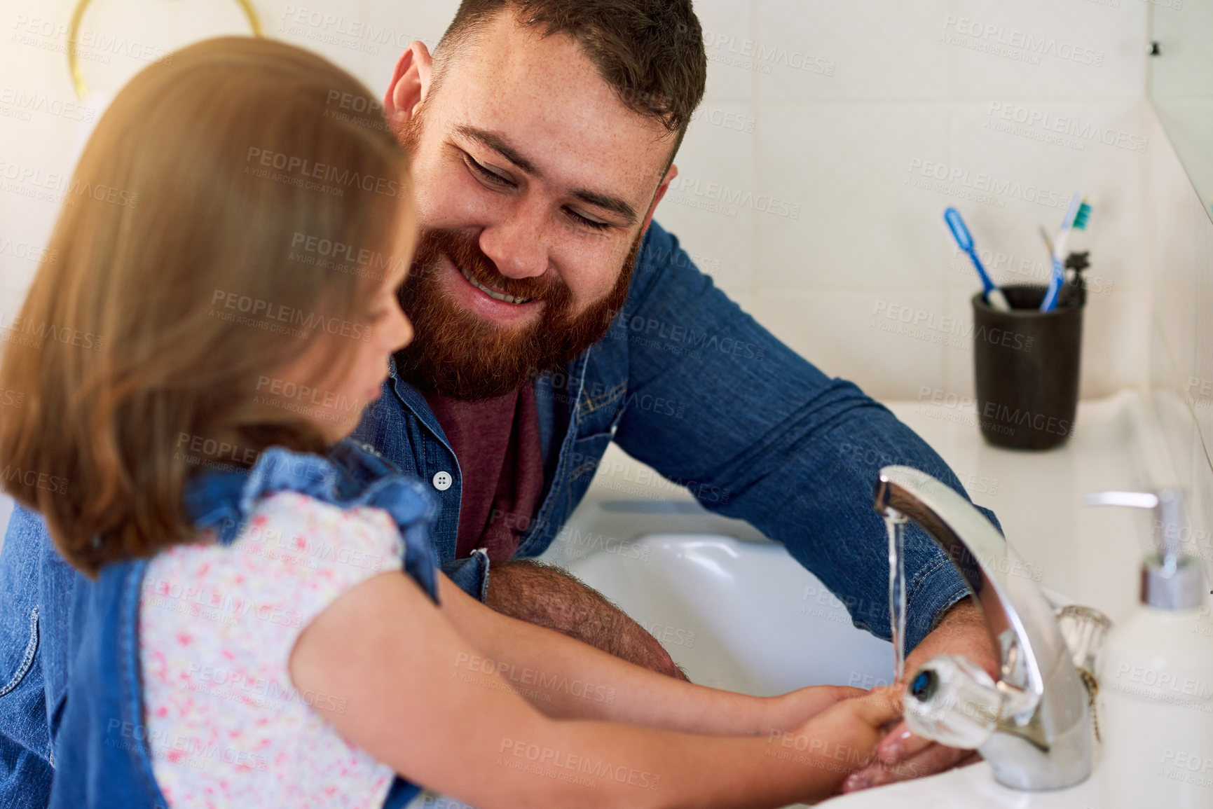 Buy stock photo Father, girl and hands to wash with water from tap for hygiene in bathroom home, bonding and smile. Happy man, dad and kid sanitize for health to get rid of bacteria, germs and child support