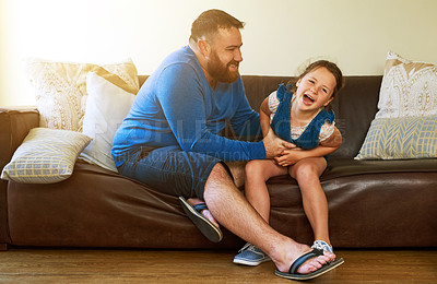 Buy stock photo Laugh, playing and father with child on sofa in home for bonding, relationship and relax together. Family, parenting and dad with girl for tickle, fun and happy in living room on holiday or weekend