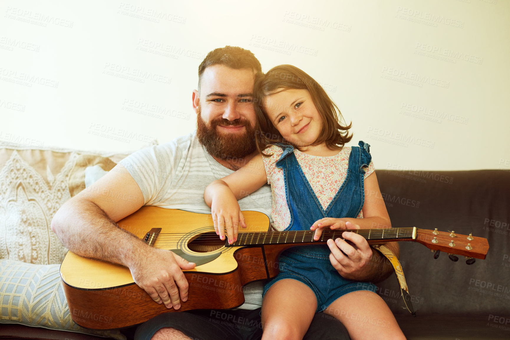 Buy stock photo Father, portrait and child with guitar on sofa, learning music and family bonding or teaching instrument in house. Weekend, childhood development and creative for knowledge, girl and playing together