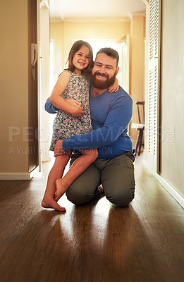Buy stock photo Shot of a father bonding with his daughter at home