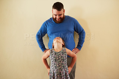 Buy stock photo Smile, care and dad in home with girl for bonding, growth and child development together on white background. Love, trust and father looking at daughter with support, fun and happy family in house