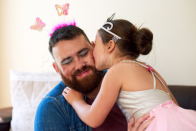 Buy stock photo Shot of an affectionate little girl playing dress up with her father at home