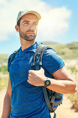 Buy stock photo Cropped shot of a young man out on a hike