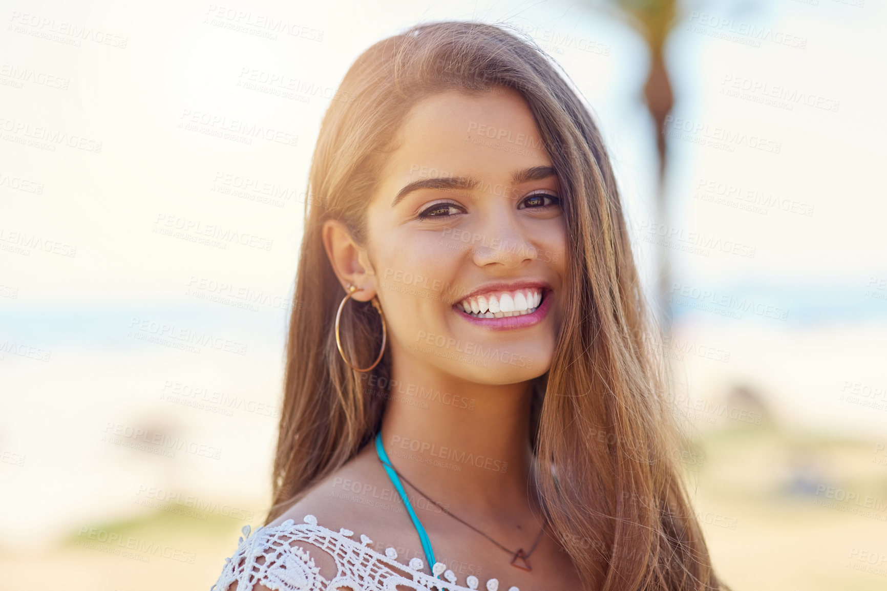 Buy stock photo Summer, holiday and portrait of girl with smile, travel or relax at beach for outdoor weekend adventure. Happy, confident and face of gen z woman on tropical island getaway for fun vacation in nature