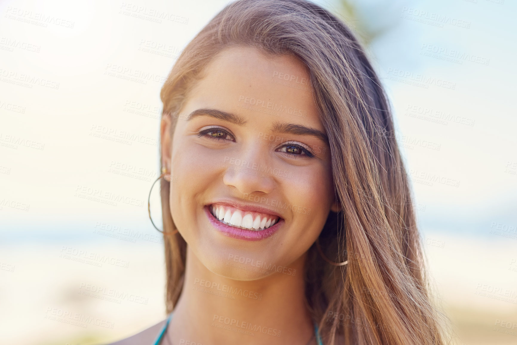Buy stock photo Summer, holiday and portrait of woman with smile, travel or relax at beach for outdoor adventure. Happy, face and closeup of confident girl on tropical island for fun vacation in nature with blue sky