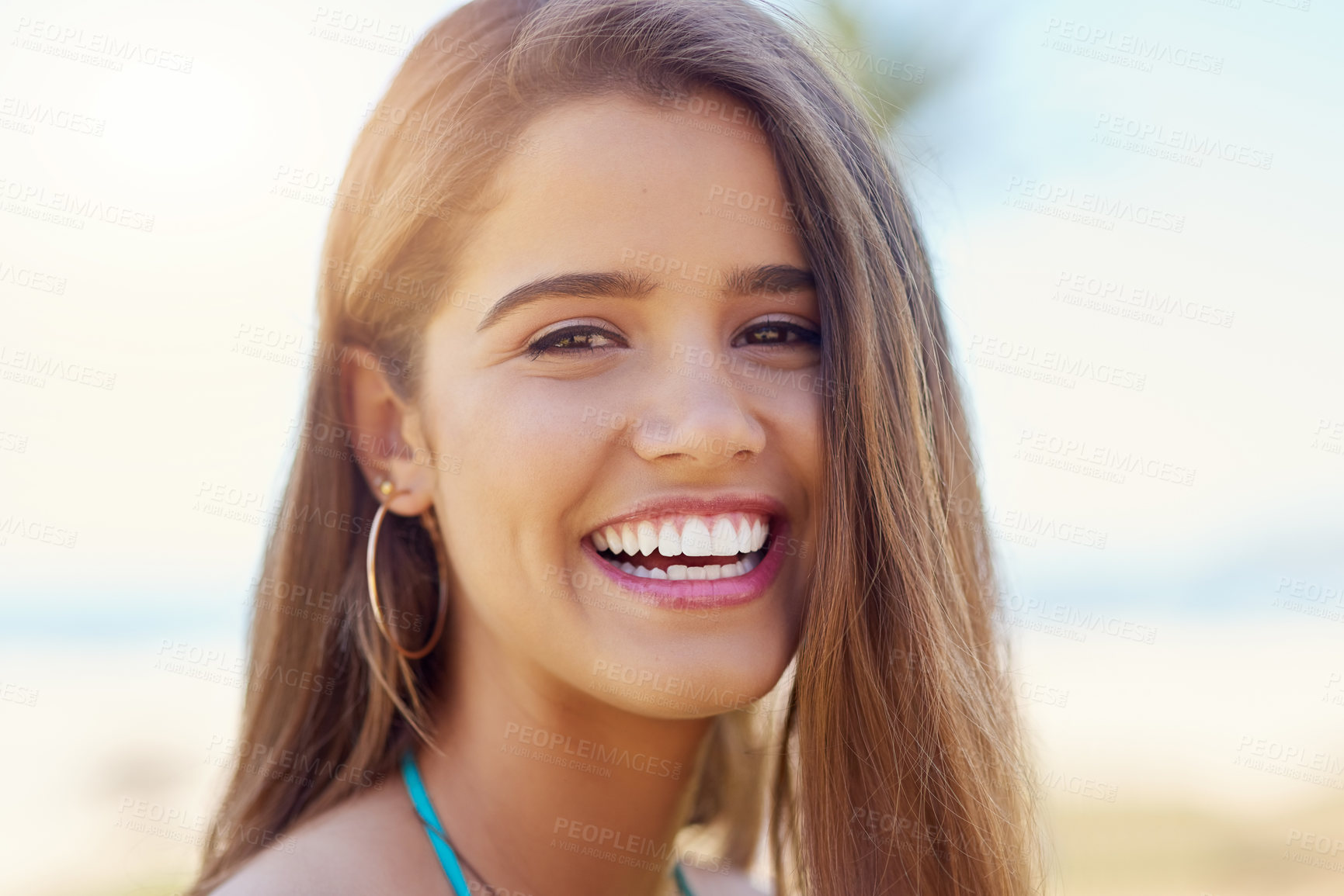 Buy stock photo Summer, holiday and portrait of girl with laugh, travel or relax at beach for outdoor adventure. Happy, face and closeup of confident woman on tropical island for fun vacation in nature with blue sky