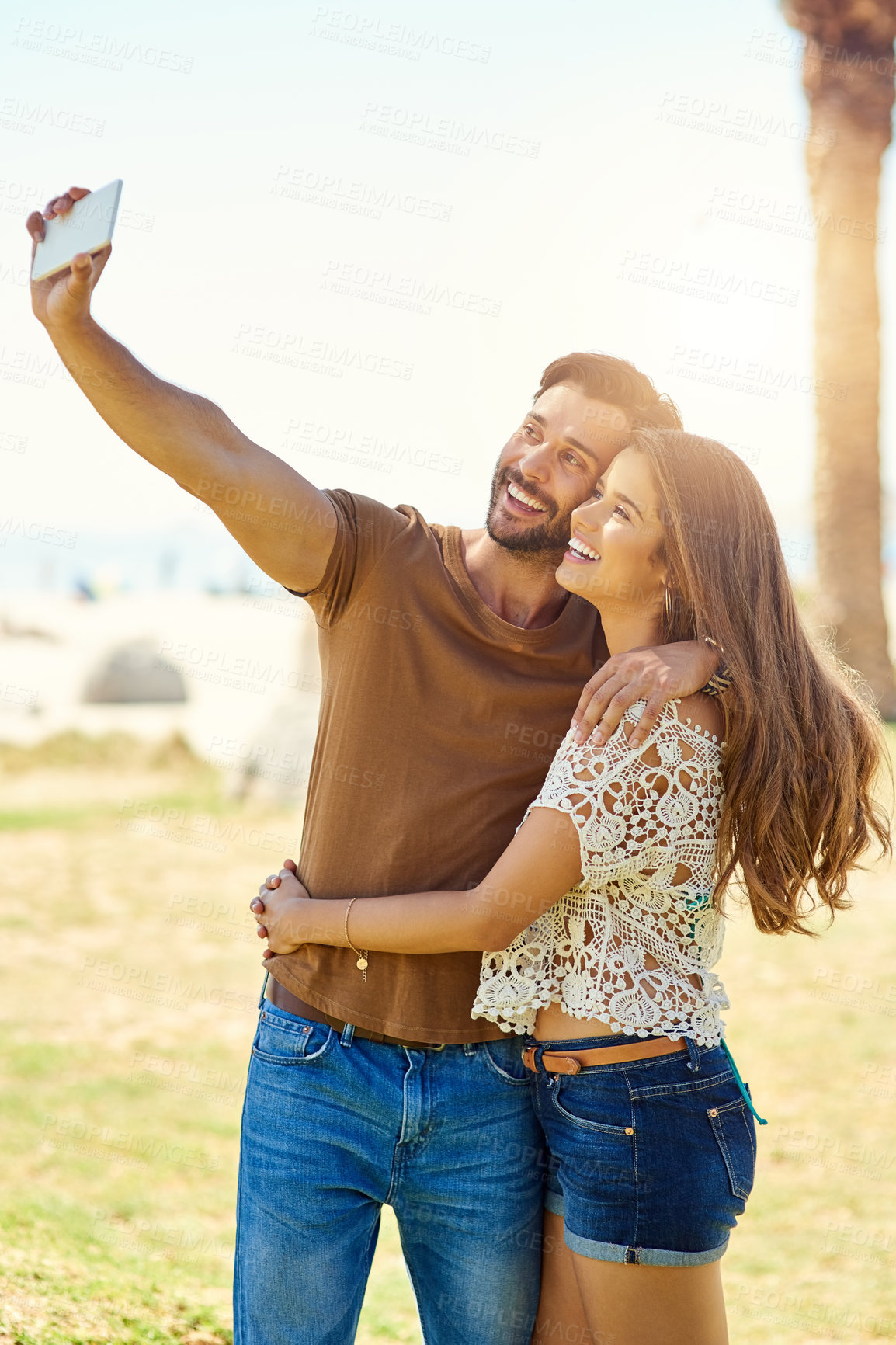 Buy stock photo Selfie, hug and couple with love, outdoor and romance with happiness, time together and relationship. Nature, embrace and man with woman, memory and profile picture with vacation, marriage and smile