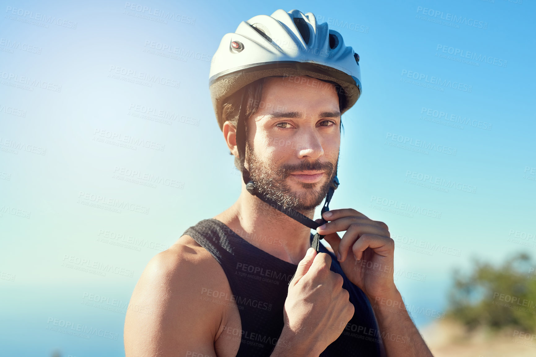 Buy stock photo Man, cyclist and portrait outdoor with helmet for fitness on mountain, cardio and workout for training for cycling tour or sports. Person, biker and gear in nature for safety and active trail riding.