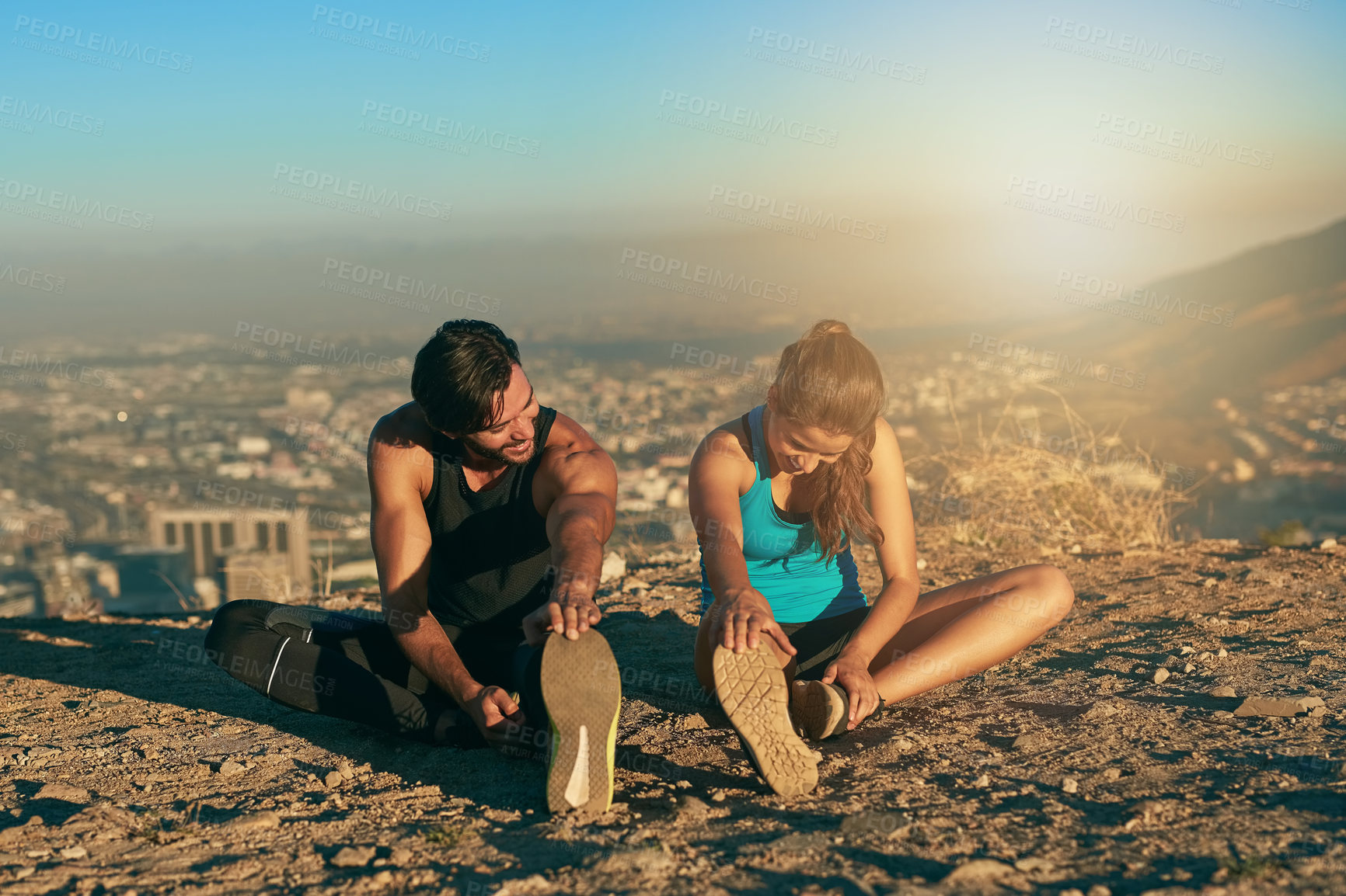 Buy stock photo Mountain, fitness and couple stretching legs together for morning workout, health and body wellness. Warm up, man and woman getting ready for muscle exercise, marathon training and support in nature