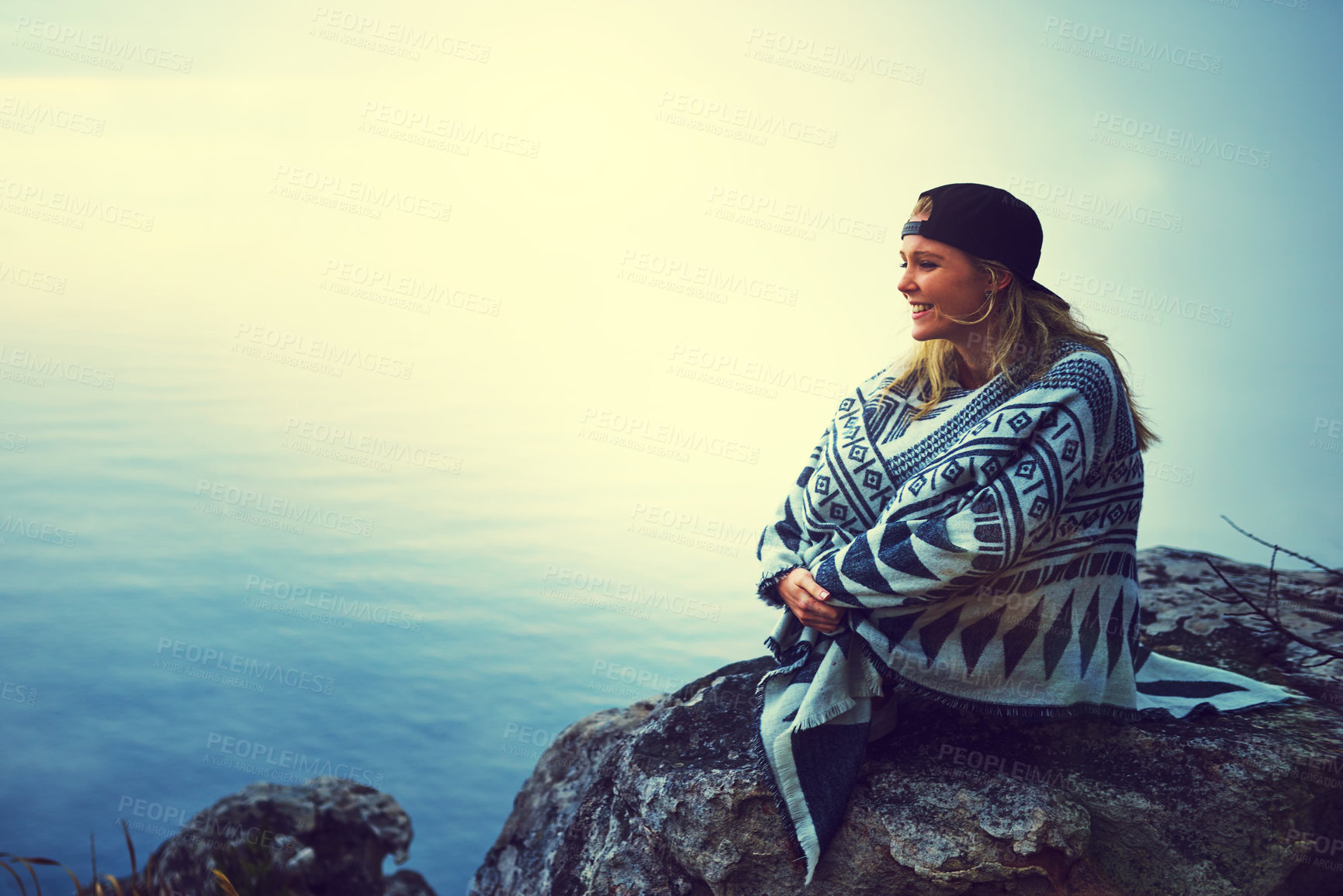 Buy stock photo Woman, hiking and sunrise on mountain with peace, calm and fog for adventure, hobby and weekend. Female person, mockup and mist in nature for travel, holiday and happiness with smile in morning