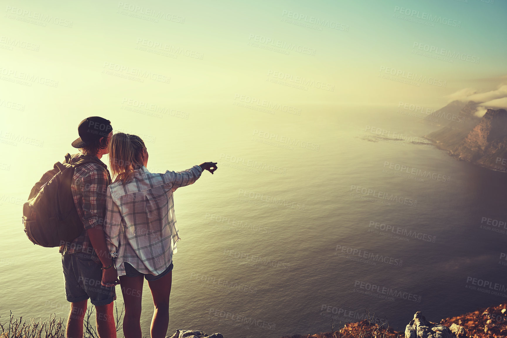 Buy stock photo Hiking, view and pointing with couple in mountains for health, exercise or sightseeing together in summer. Peru, nature and travel with man, woman and holding hands on summit trail for mockup