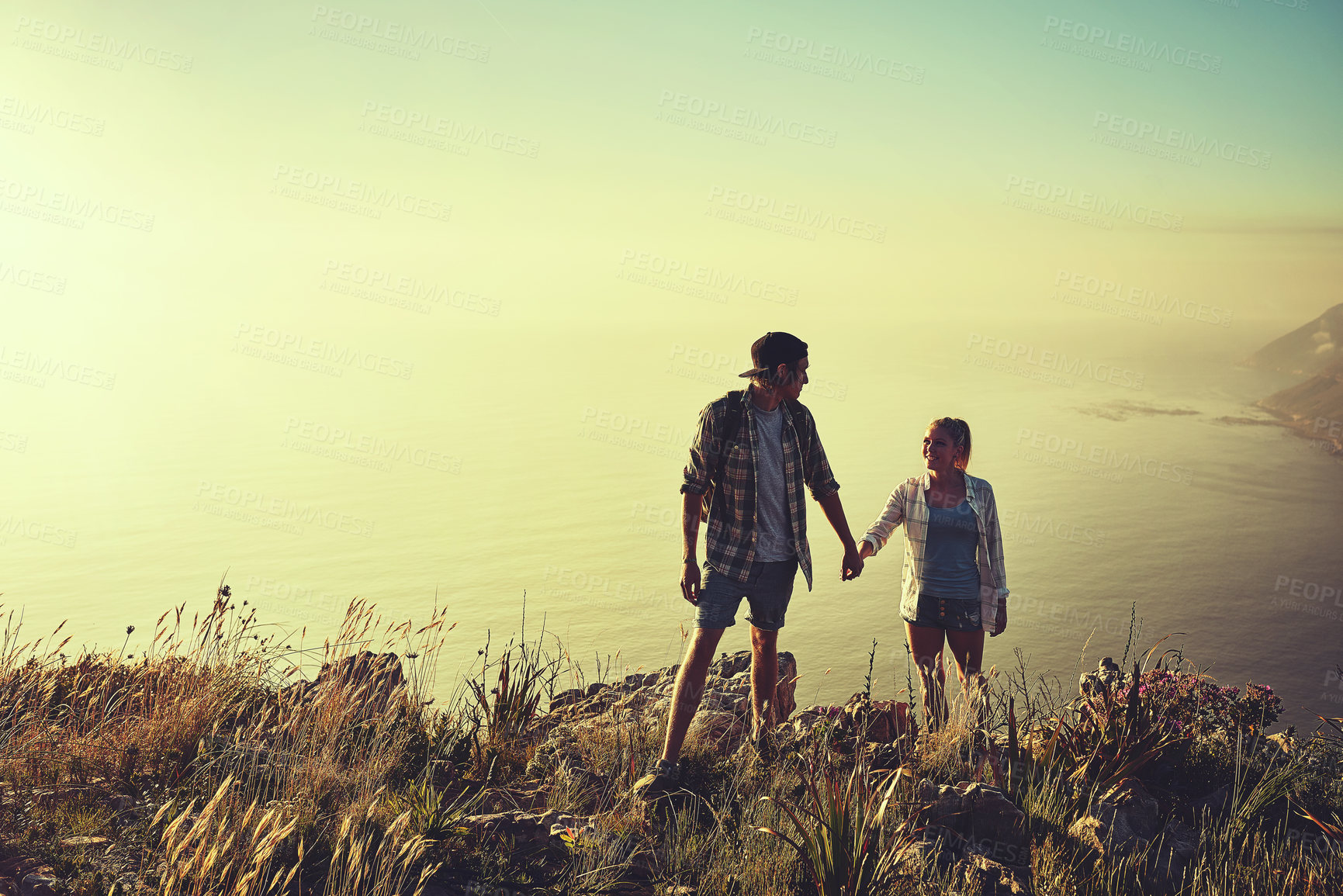 Buy stock photo Hiking, holding hands and travel for couple in mountains for health, exercise or sightseeing together in summer. Peru, nature and travel with man, woman and view on summit trail for horizon adventure