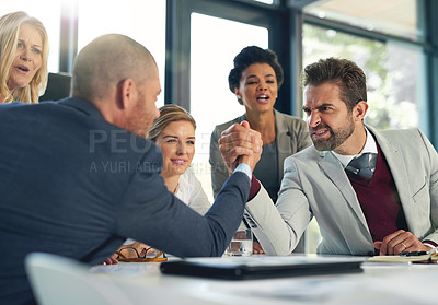 Buy stock photo Cropped shot of businesspeople arm wrestling in an office