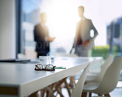 Buy stock photo Business people, boardroom and interior for meeting, partnership or corporate discussion at conference. Businessman in team collaboration with glasses and notes on table at the office or workplace
