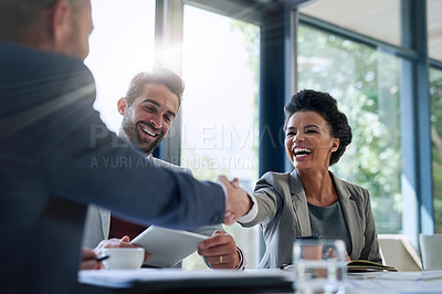 Buy stock photo Meeting, partnership and business people shaking hands in the office for a deal, collaboration or onboarding. Diversity, professional and employees with handshake for agreement, welcome or greeting.