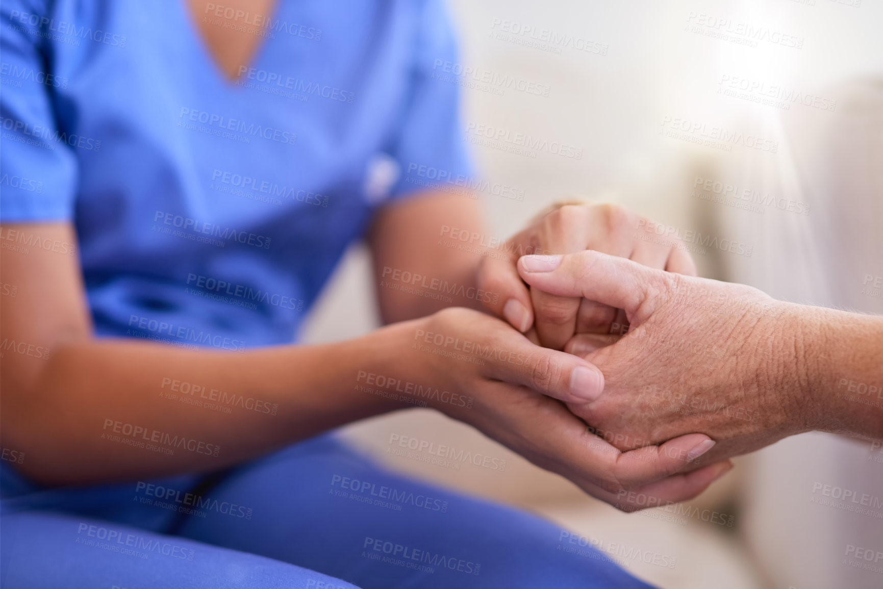 Buy stock photo Nurse, advice and senior woman holding hands on sofa  for health, consulting or compassion. Lens flare, caregiver and elderly patient for hope, trust or medical conversation at retirement home