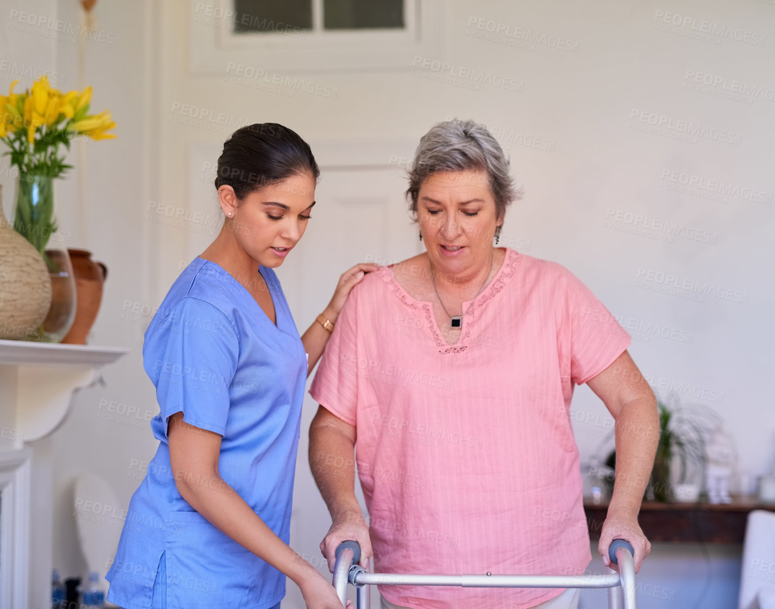 Buy stock photo Woman, caregiver and helping walker at nursing home for mobility support, physical therapy or hope for healing disability. Nurse, patient and physiotherapy for anatomy, balance or rehabilitation

