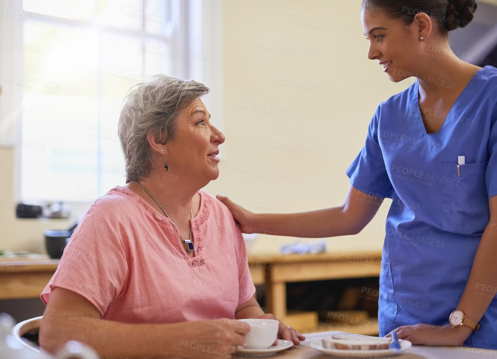 Buy stock photo Cropped shot of a caregiver with a senior patient in a nursing home