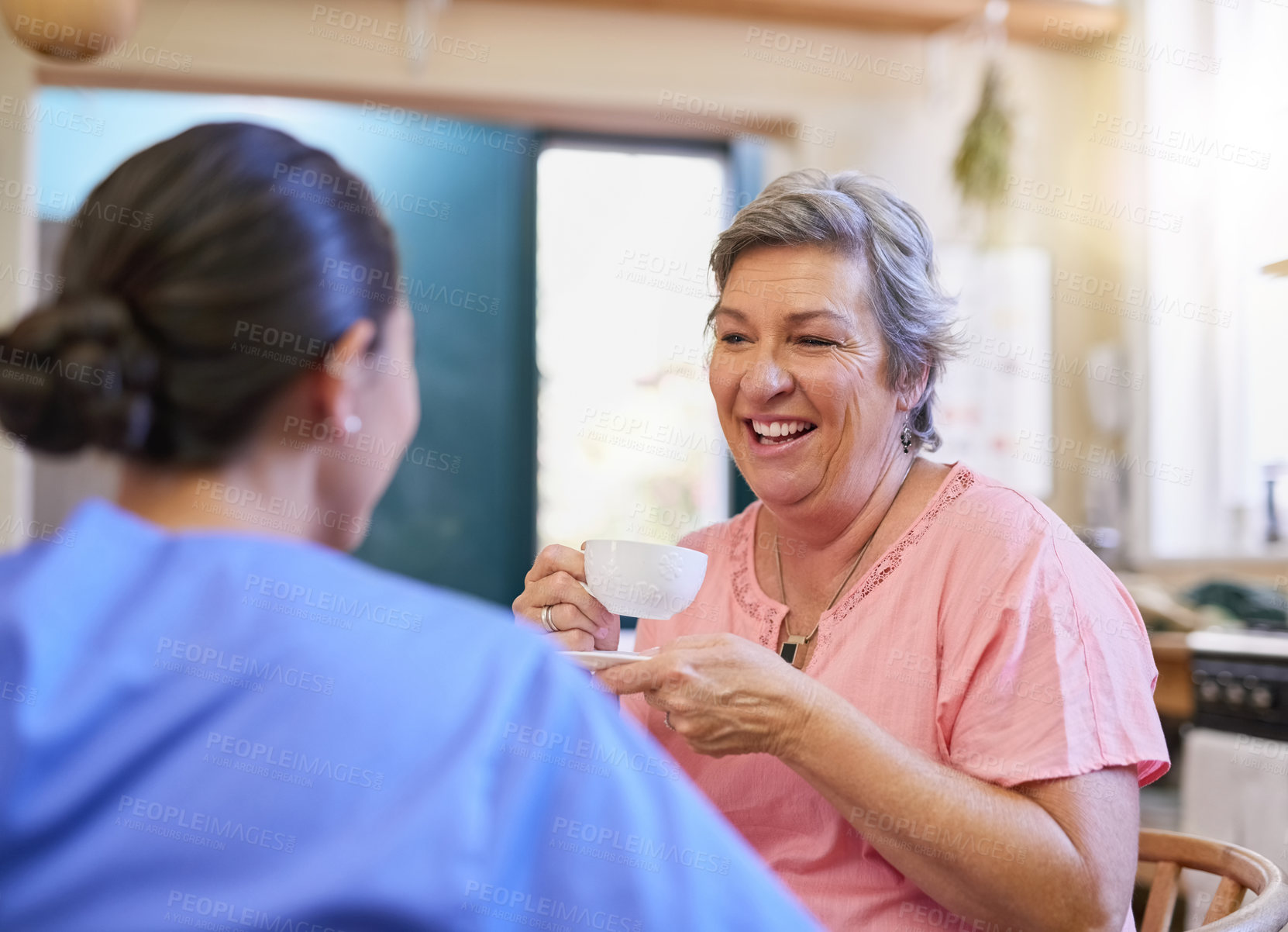 Buy stock photo Therapy, nurse and senior woman in kitchen for consultation, kindness and mental health. Tea, discussion and medical worker or caregiver with retired female person in home for conversation and advice