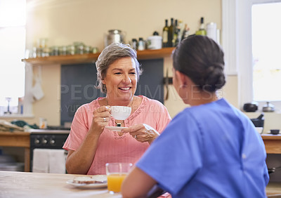 Buy stock photo Happy, senior woman and nurse in kitchen for therapy, consultation and mental health. Tea, discussion and medical worker or caregiver with retired female person in home for conversation and advice