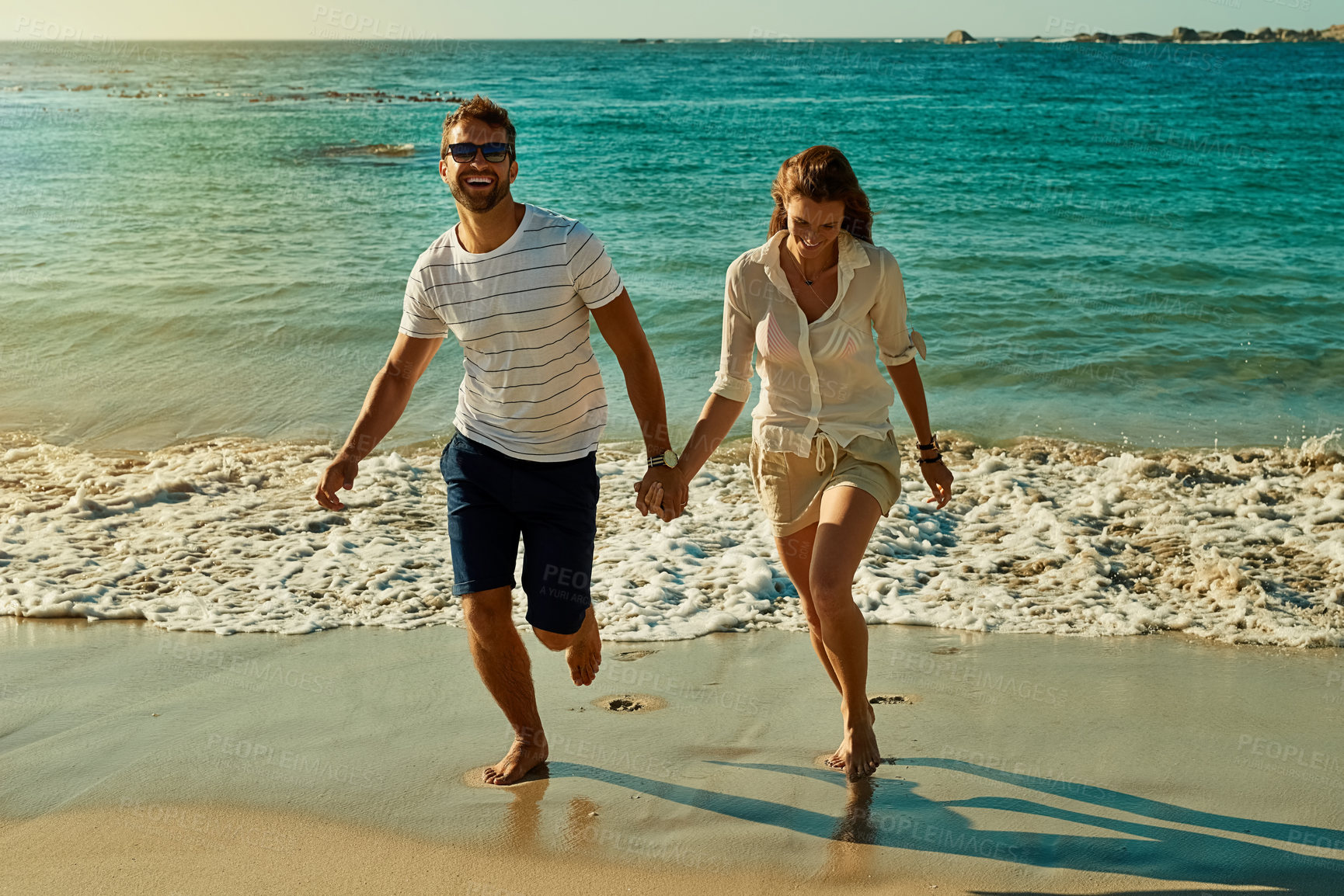 Buy stock photo Beach, play and couple for joy, honeymoon and travel for fun, running and Miami vacation. Woman, holding hands or sea on date to show partner adventure, happiness or bonding or romance on holiday