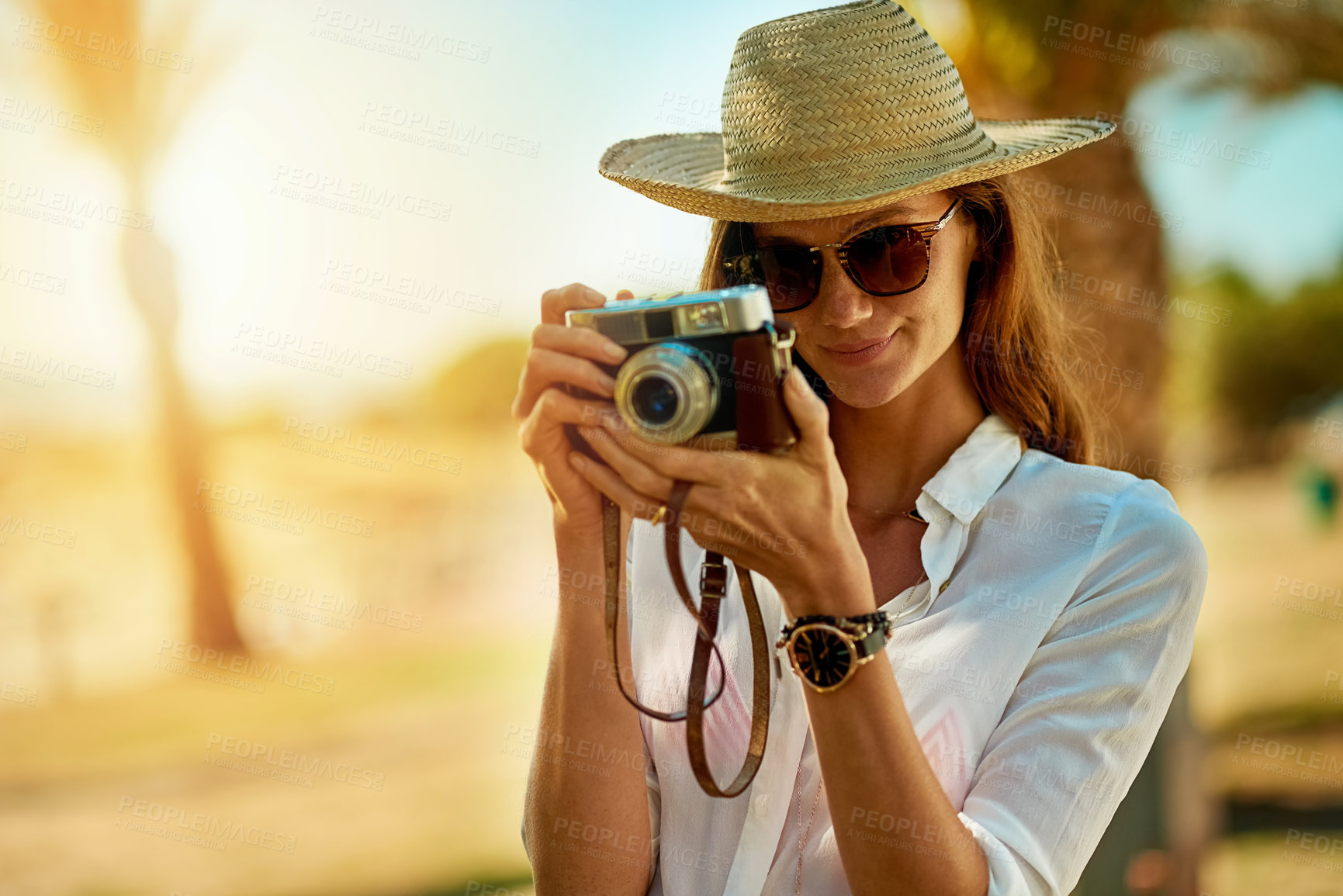 Buy stock photo Beach, holiday and woman with camera in photography for outdoor adventure, summer vacation or memory. Photographer, smile and portrait with sunglasses for travel blog, documentary and tourism in Bali