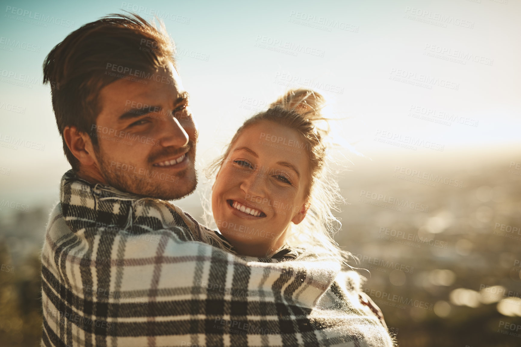Buy stock photo Portrait, happy and couple with blanket on mountain for hiking adventure, bonding and wake up from trekking journey. Smile, man and woman with love, relax and peace for hug on romance date outdoor