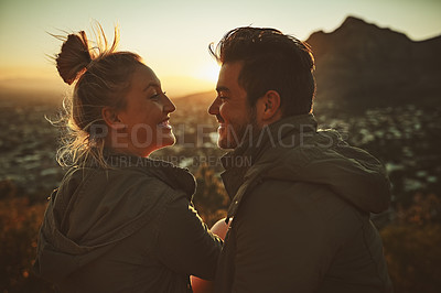 Buy stock photo Cropped shot of an affectionate couple spending the day outdoors