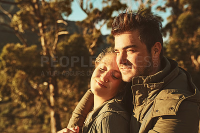 Buy stock photo Cropped shot of an affectionate couple spending the day outdoors