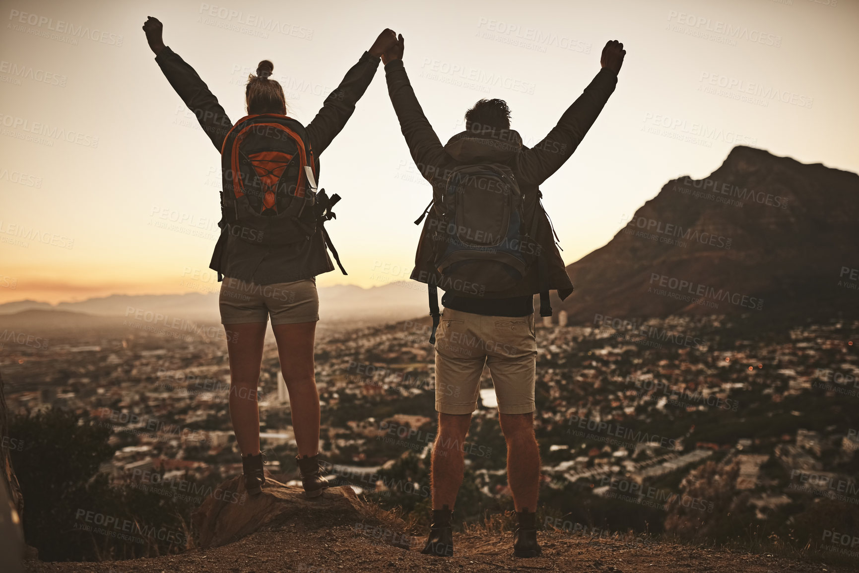 Buy stock photo Couple, arms and hiking celebration in nature for achievement, goals and fitness on mountain. Man, woman and winning outdoor or happy on hill for trekking success, training and summit peak in Mexico