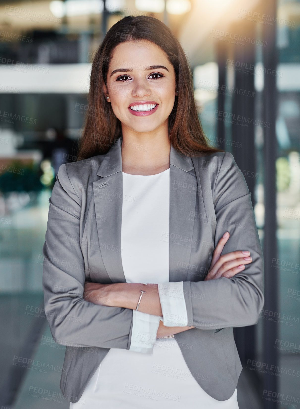 Buy stock photo Business woman, smile and portrait with arms crossed of law clerk and lawyer admin intern at job. Pride, corporate and legal employee with young professional with confidence from career opportunity