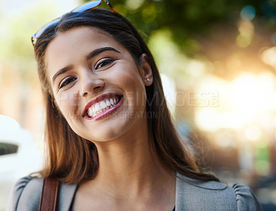 Buy stock photo Cropped portrait of an attractive young woman on her morning commute to work