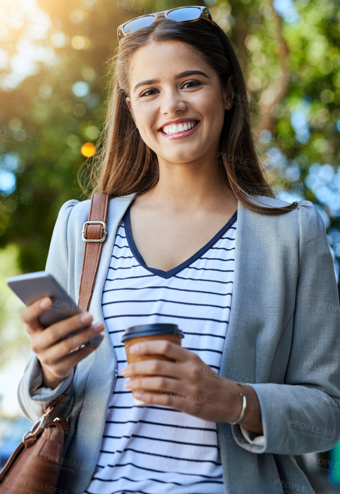 Buy stock photo Outdoor, woman and smile on smartphone with coffee for social media post and networking, Female person, employee and portrait in street to travel for work or office on internet or website for news