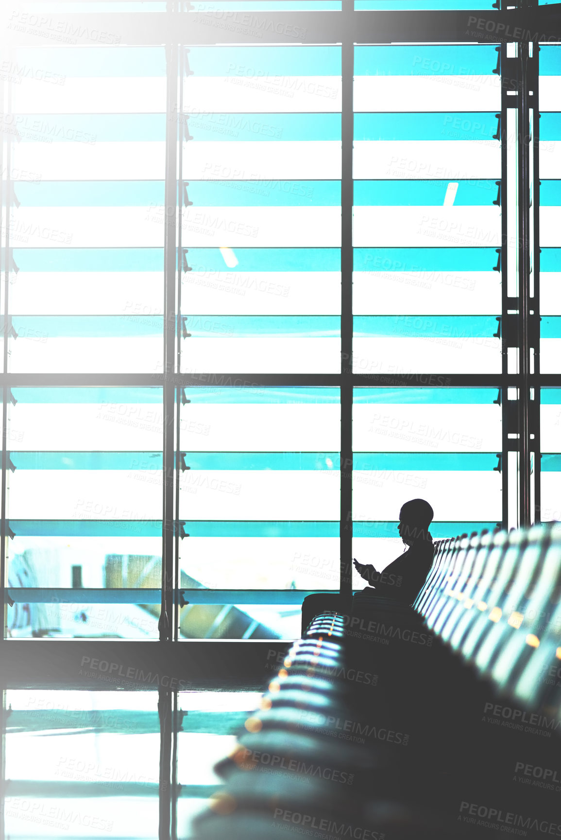 Buy stock photo Airport, lobby and silhouette of businessman with phone for network, communication and company trip. Waiting, chair and person with tech in lounge for travel website, check in and flight update