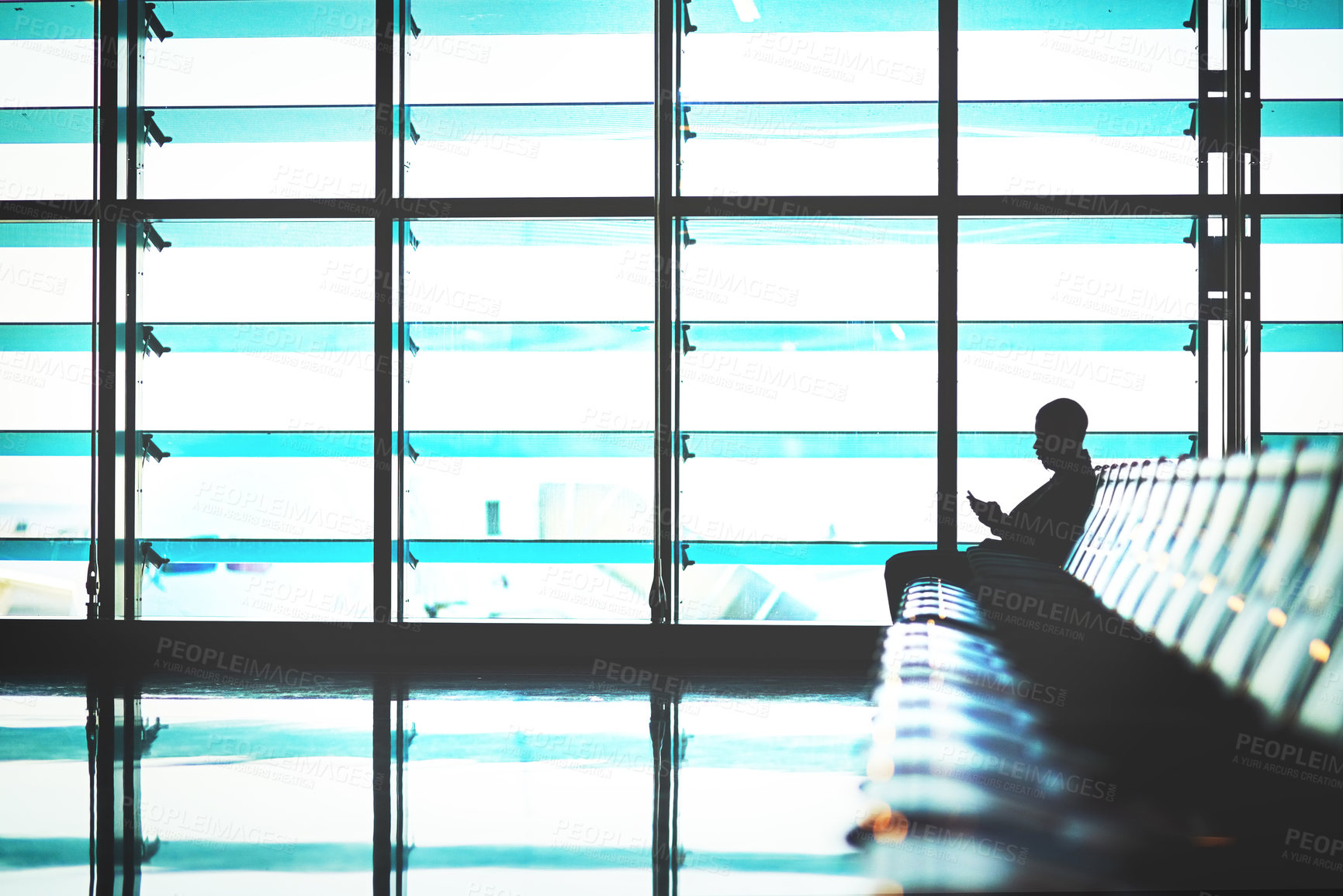 Buy stock photo Airport, lounge and silhouette of businessman with phone for communication, network and company trip. Chair, waiting and person with tech in lobby for travel website, check in and flight update