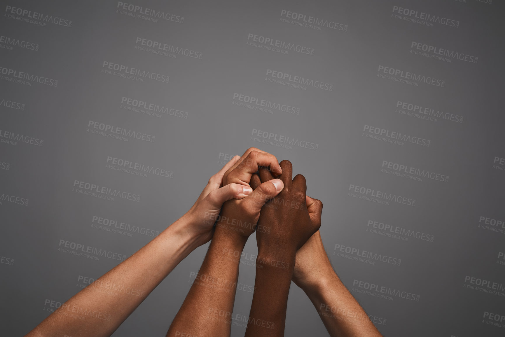 Buy stock photo Teamwork, support and hands in studio for diversity, inclusion and acceptance against discrimination. People, society or community with trust for solidarity, awareness and mockup by gray background