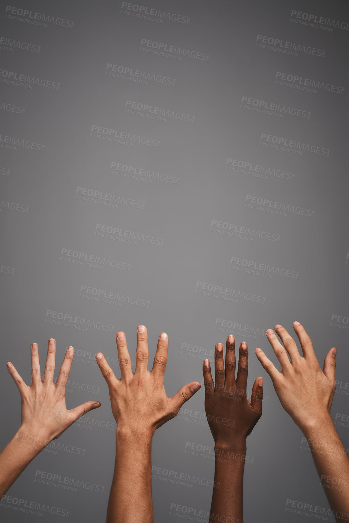 Buy stock photo Studio shot of unidentifiable hands reaching up towards blank copyspace