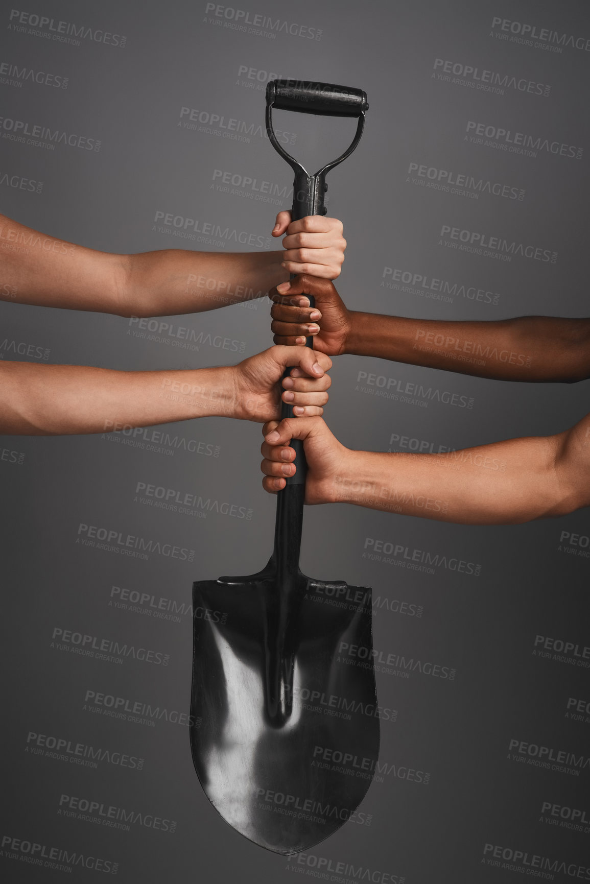 Buy stock photo Studio shot of unidentifiable hands holding on to a shovel against a gray background