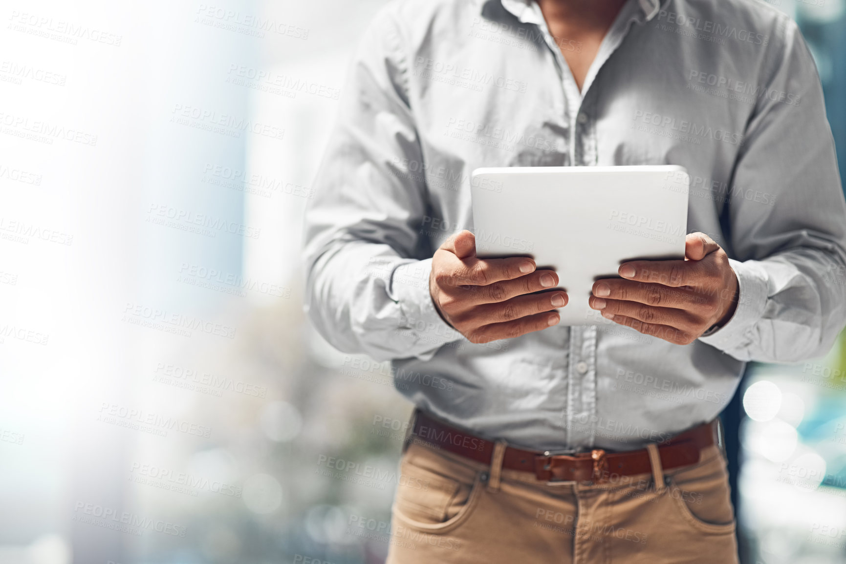 Buy stock photo Businessman, hands and research with tablet for online browsing, news or network at office. Closeup of male person, employee or analyst with technology for app, innovation or development at workplace