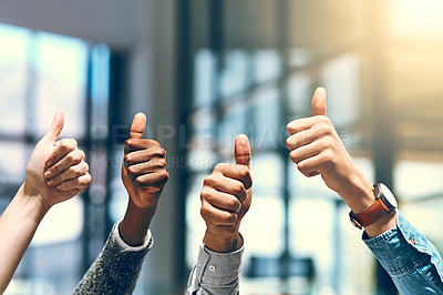 Buy stock photo Cropped shot of a group of unrecognizable businesspeople gesturing thumbs up