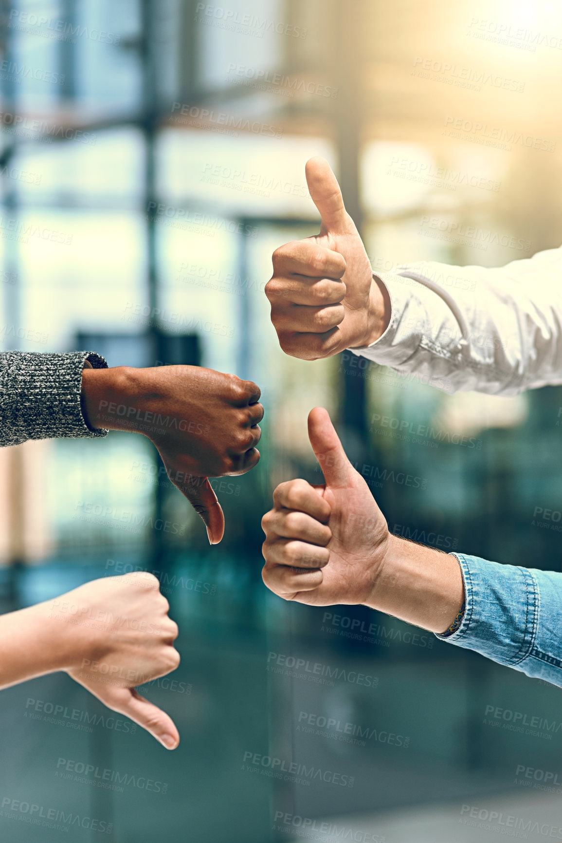 Buy stock photo Office, hands and business people with thumbs up and down for vote, decision and choice for corporate project. Teamwork, employees or managers with reaction gesture for yes, no and feedback by flare