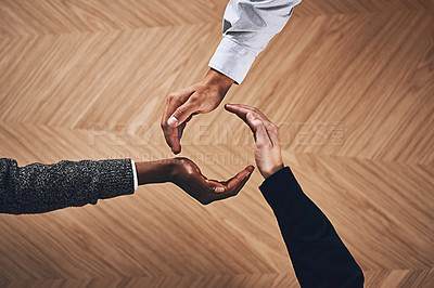 Buy stock photo Teamwork, collaboration or hands of business people in circle for motivation, support or recycling in office. Diversity, recycle or top view of employees for goals, community or corporate partnership