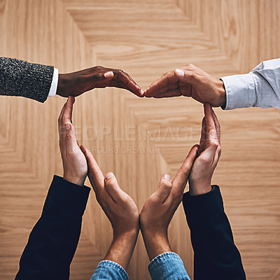 Buy stock photo Diversity, heart or hands of business people in support for trust, teamwork or community inclusion in office. Love gesture, above or employees in group collaboration with hope or kindness for charity