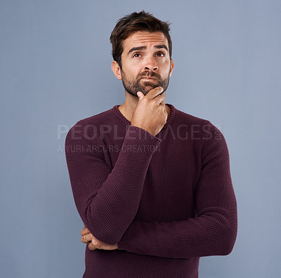 Buy stock photo Thinking, confused and face of man in studio with unsure, uncertain and thoughtful on gray background. Doubtful, mockup space and isolated male person skeptical for decision, choice and question