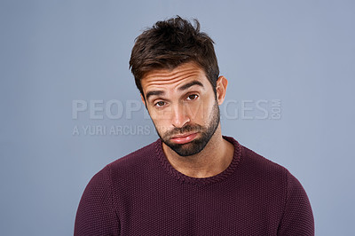 Buy stock photo Bored, portrait and annoyed man in studio tired and moody against a grey background space. Fatigue, face and man with negative attitude posing with exhasuted expression while standing isolated 