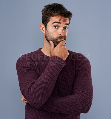 Buy stock photo Idea, thinking and portrait of man in studio with unsure, wonder and thoughtful on blue background. Doubt, mockup space and face of isolated male person skeptical for decision, choice and question