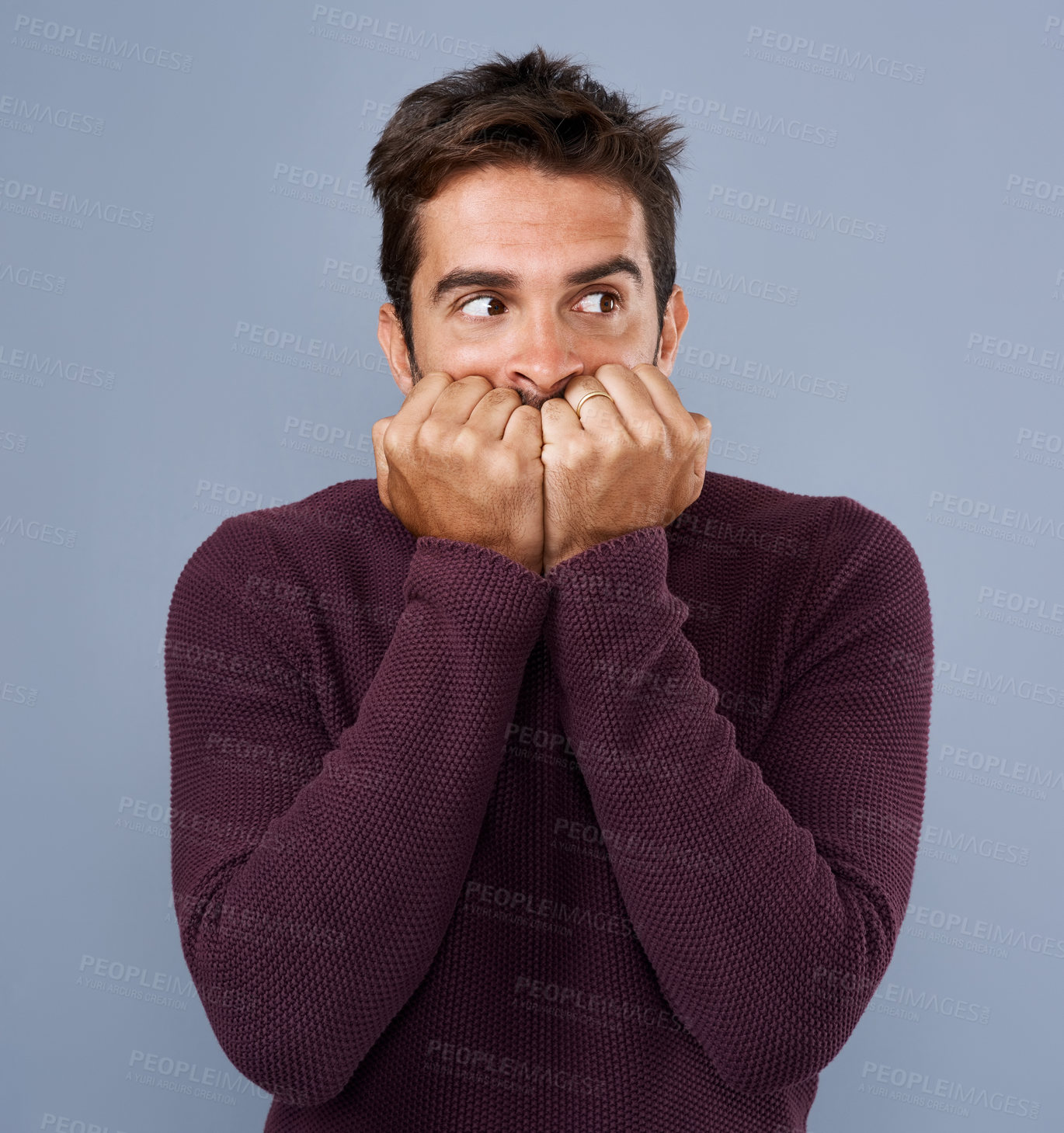 Buy stock photo Worry, afraid and phobia of man in studio, anxiety and biting of nails for stress, scared and fear. Gray background, mockup space and person with terror for nightmare of fail in test of college